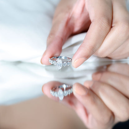 Marquise Cut Moissanite Engagement Ring with Side Stones